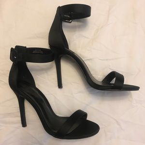 Black high heels with buckle